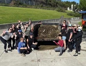 Manson & Chi team volunteering at a park clean up.