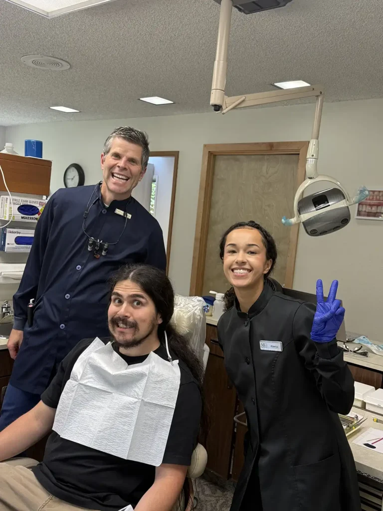 Top-Rated Dentist in Kirkland, WA Dr. Manson and Dental Patient at Free Dentistry Day Event